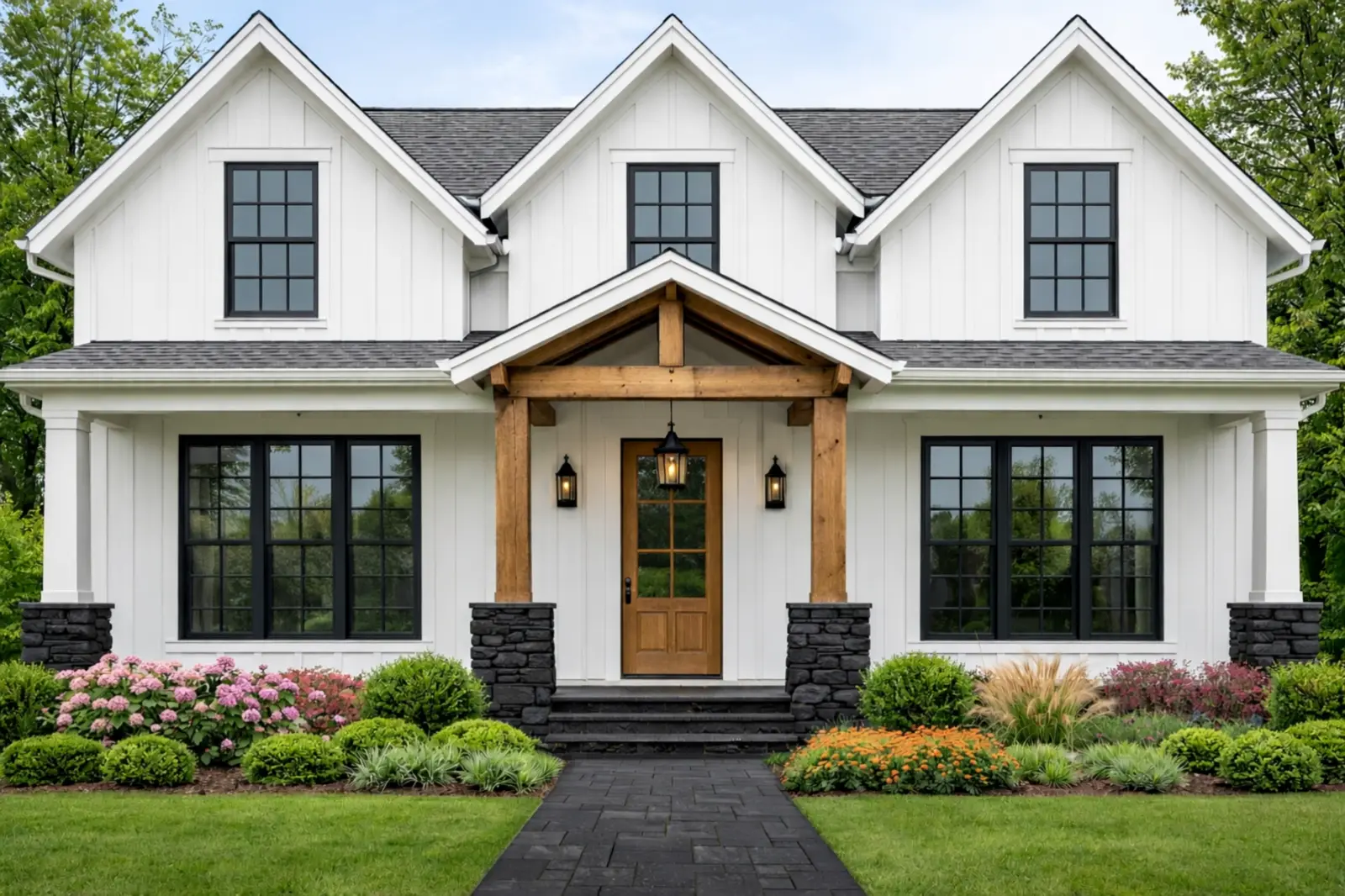 White farmhouse-style home with black replacement windows